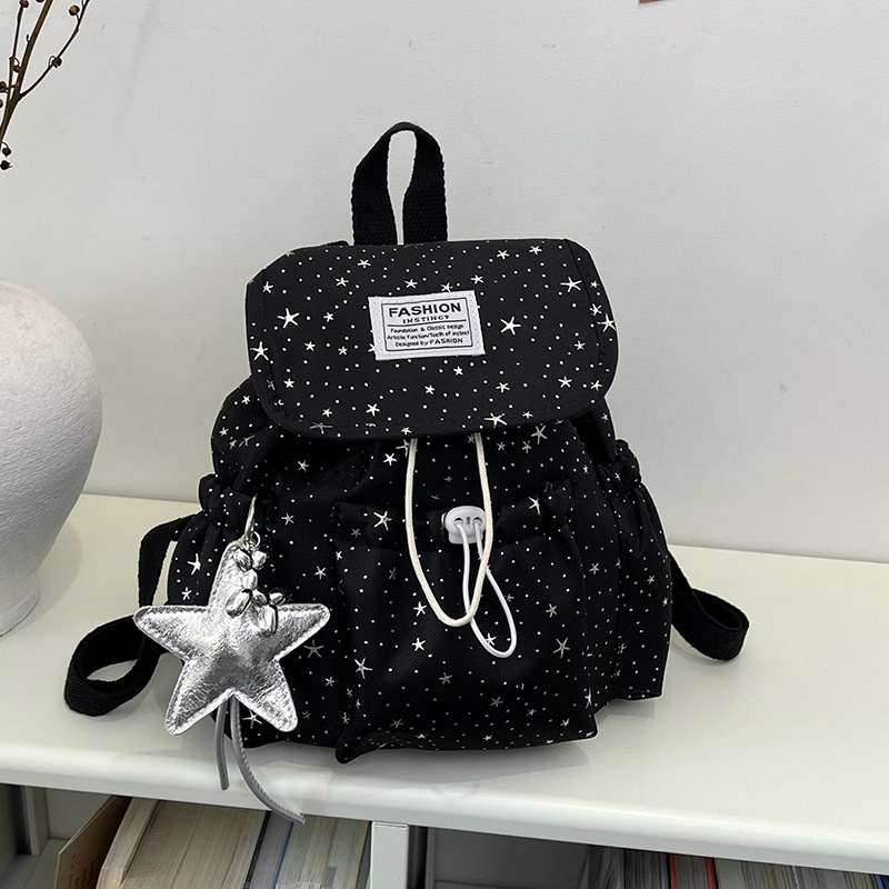 Primavera nuevo estilo ins leche de viento bonito joven estrella impresa mochila de hombro para mujeres de alto valor dulce mochila pequeña
