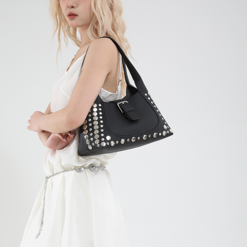 Bolso de axila con textura transfronteriza 2025 primavera y verano nuevo bolso femenino bolso retro con patrón de lichi bolso de hombro con remaches personalizado