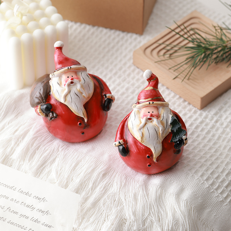 Buscando madera transfronteriza nueva decoración navideña resina muñeco de nieve decoración de escritorio retro micro paisaje diseño de props