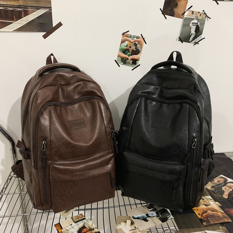 Mochila de escuela secundaria mayorista de moda de hombre mochila de cuero suave de moda de hombre sensación avanzada de mochila de escolares de escuela secundaria