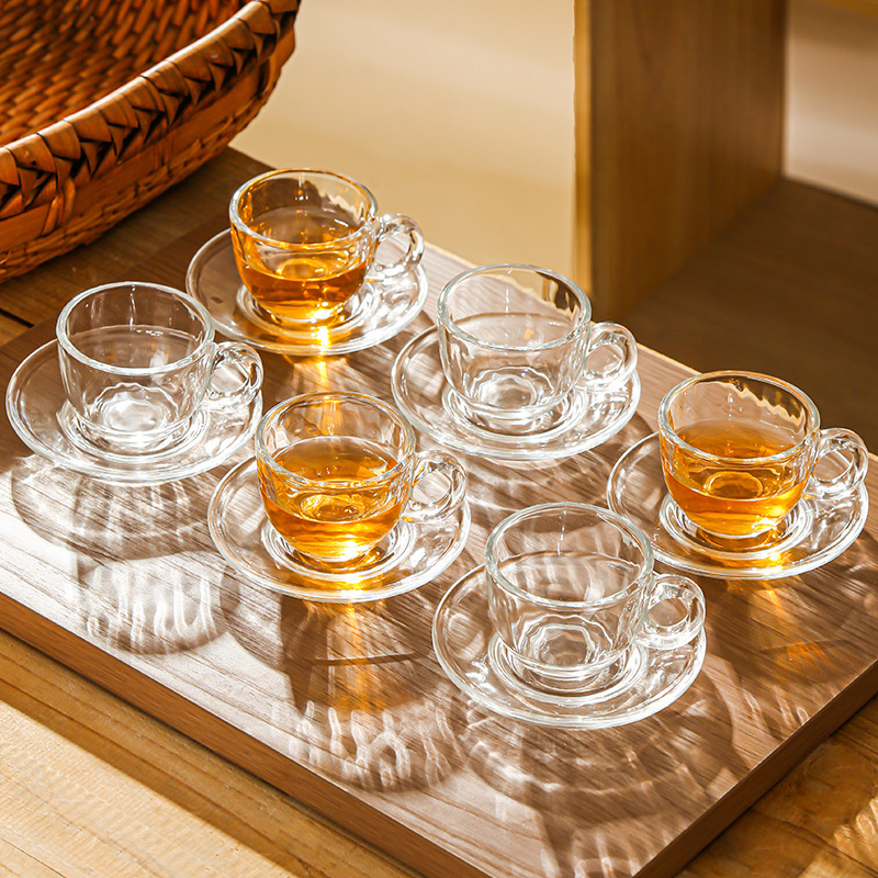 Juego de tazas y platillos de café de vidrio transfronterizo Taza de café con leche americana Taza de té transparente resistente al calor Taza de café de lujo europea