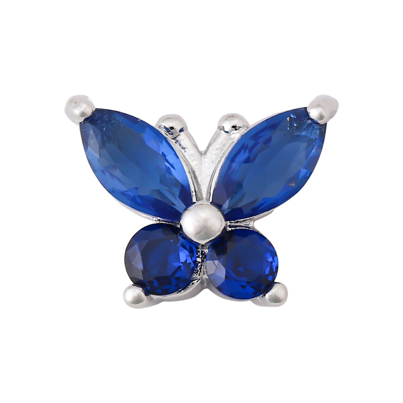 Lujo ligero súper centelleante mariposa de circón joyería de uñas metal súper hada pequeña mariposa manual uñas accesorios al por mayor