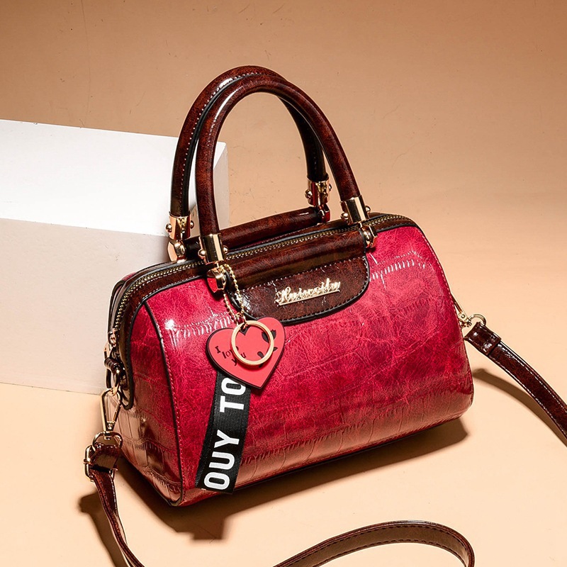 Bolso de textura 2025 nuevo bolso de hombro con diseño de patrón de piedra, bolso de mensajero universal de asistencia informal, bags transfronterizos