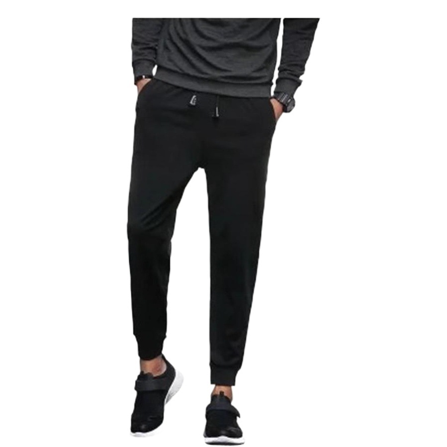 Pantalones deportivos casuales de primavera y otoño para hombres pantalones de chándal pantalones harén flacos pantalones atados al tobillo Pantalones slim fit hombres de moda coreana