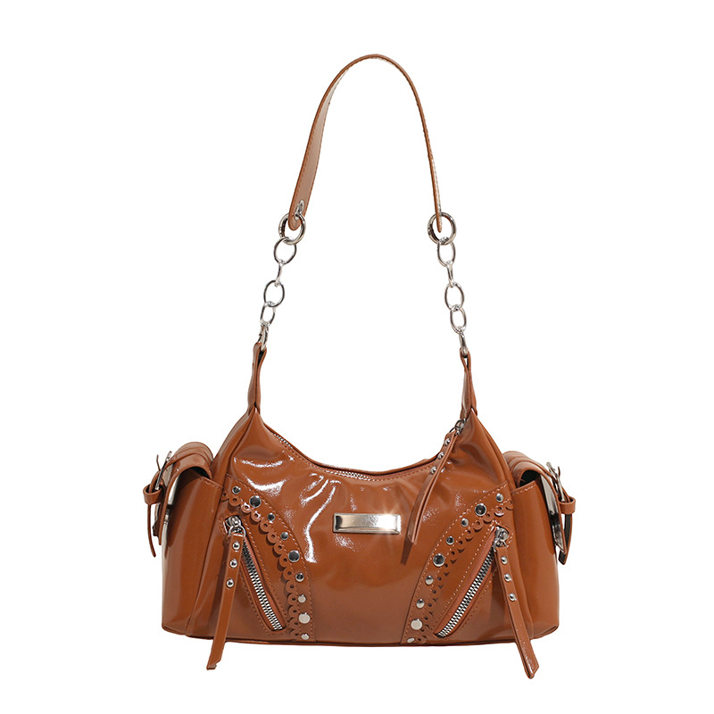 Bolso de axila de textura de alta calidad 2025 verano nuevo bolso femenino personalizado bolso de remache retro bolso de hombro de gran capacidad