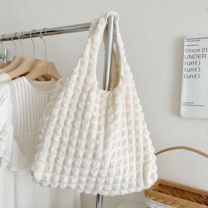 2023 nuevo plisado burbuja nube bolsa de hombro de moda todo fósforo nicho de compras de alta calidad de gran capacidad bolsa