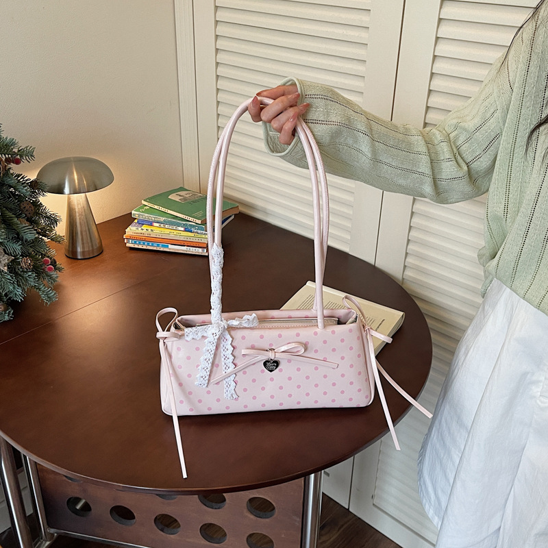 Bolsa de brazo de punto de onda popular de verano para mujeres 2026 nueva moda bolso de palo de viaje bolso de hombro diario
