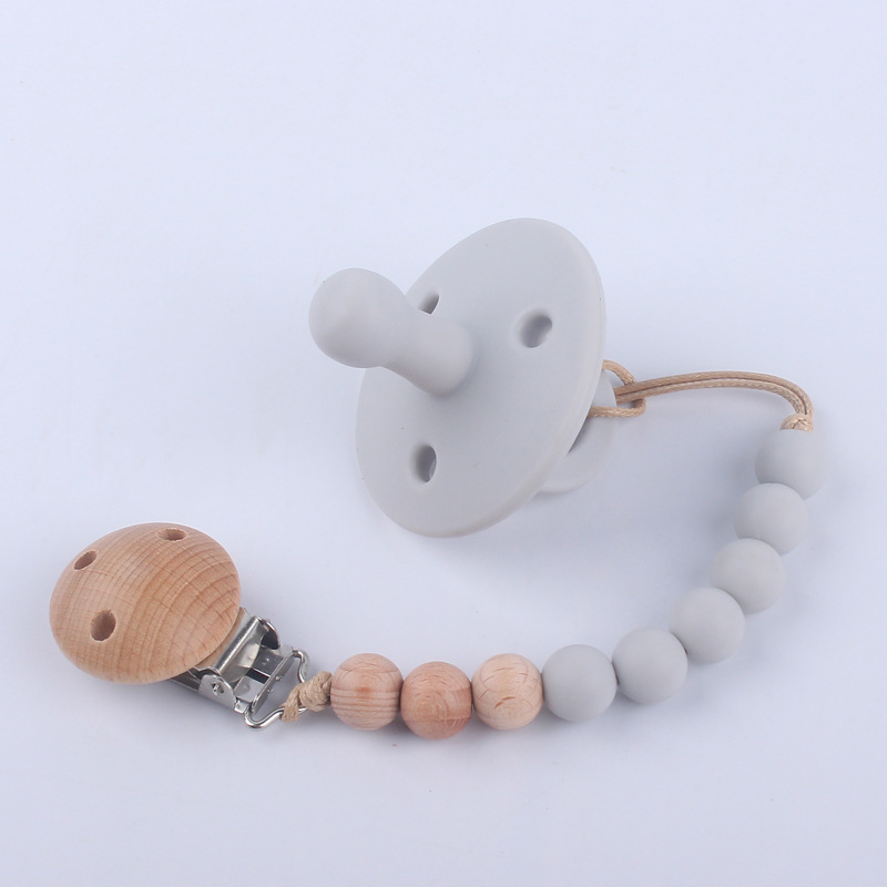 Nuevos suministros para bebés chupete bebé pezón de silicona creativo bebé mordida Cadena de pezón de silicona conjunto de dos piezas