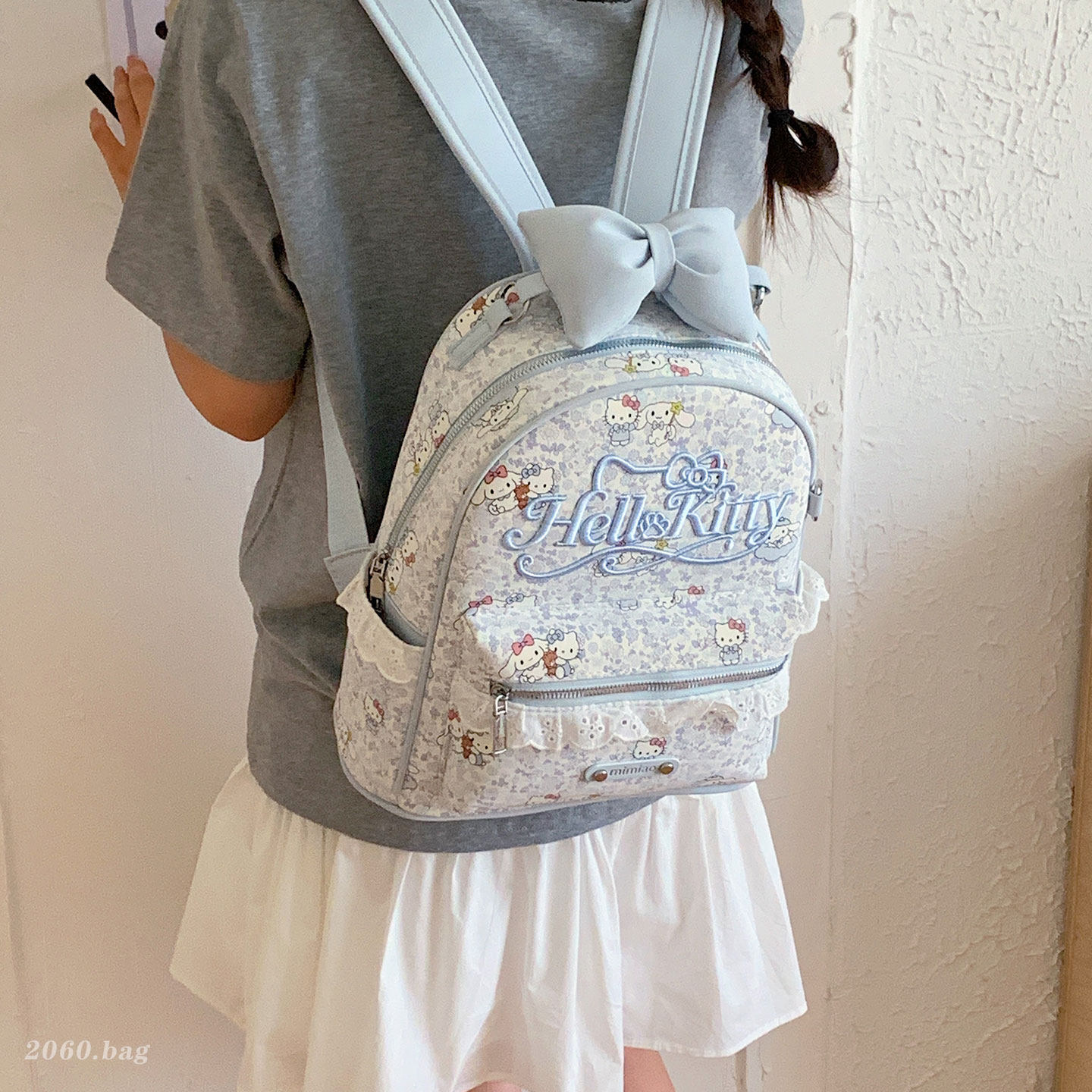 Flores de viaje femenina 2026 clase caricatura lindo nuevo tipo de mochila gato arco mochila de viaje