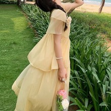 黄色高级感小众茶歇裙女2024夏季新款设计感慵懒度假风蛋糕连衣裙