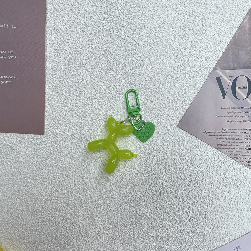 Pequeño Libro Rojo mismo lindo jalea globo láser perro llavero colgante colorido cachorro de dibujos animados teléfono llavero