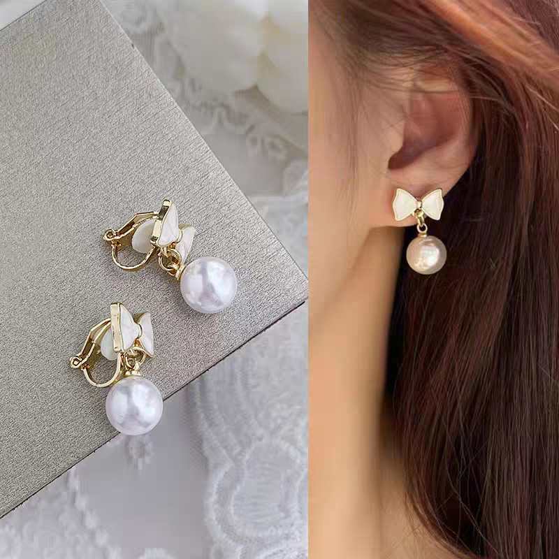 2025 nuevo estilo flor borla sin agujeros para las orejas placa de incienso para mosquitos pinzas para las orejas para las mujeres, pendientes de lujo ligero de alta calidad, pinzas para las orejas indoloras