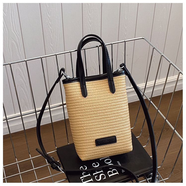 Summer straw woven beach bag 2025 New style seaside vacation handbag, simple and versatile bucket bag, woven crossbody bag undefined