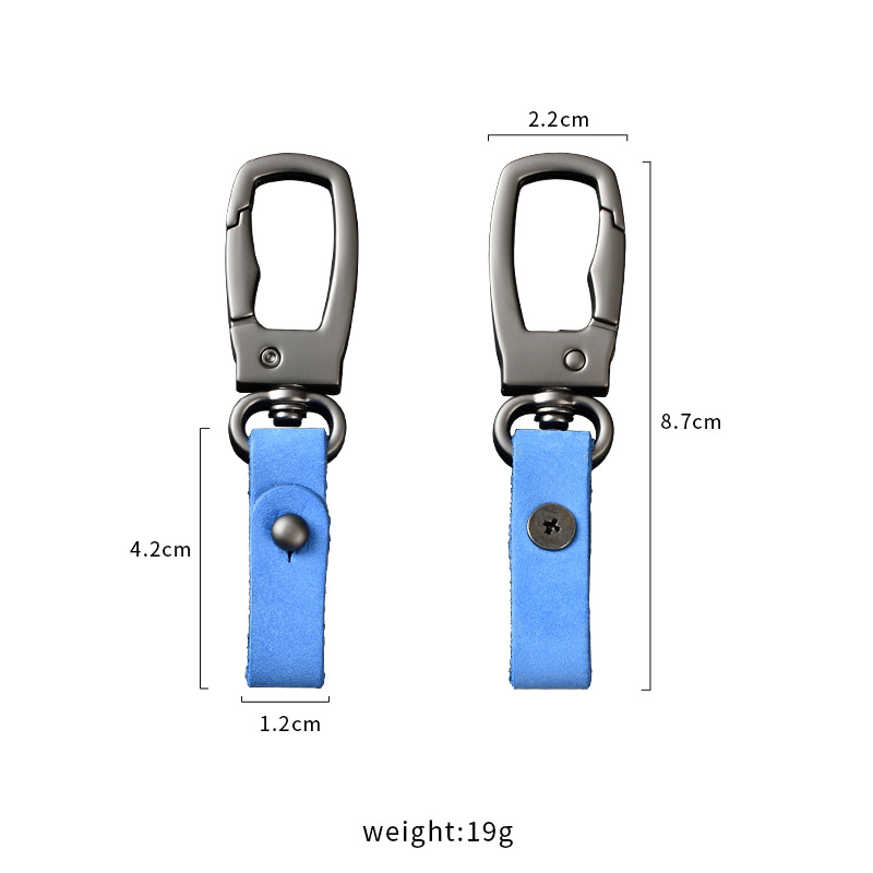 軽くて豪華な本革の自動車のキーホルダーの頭の層のつや消しの牛革の車のキーチェーンの個性のカップルの腰は掛けてペンダントをなくします。