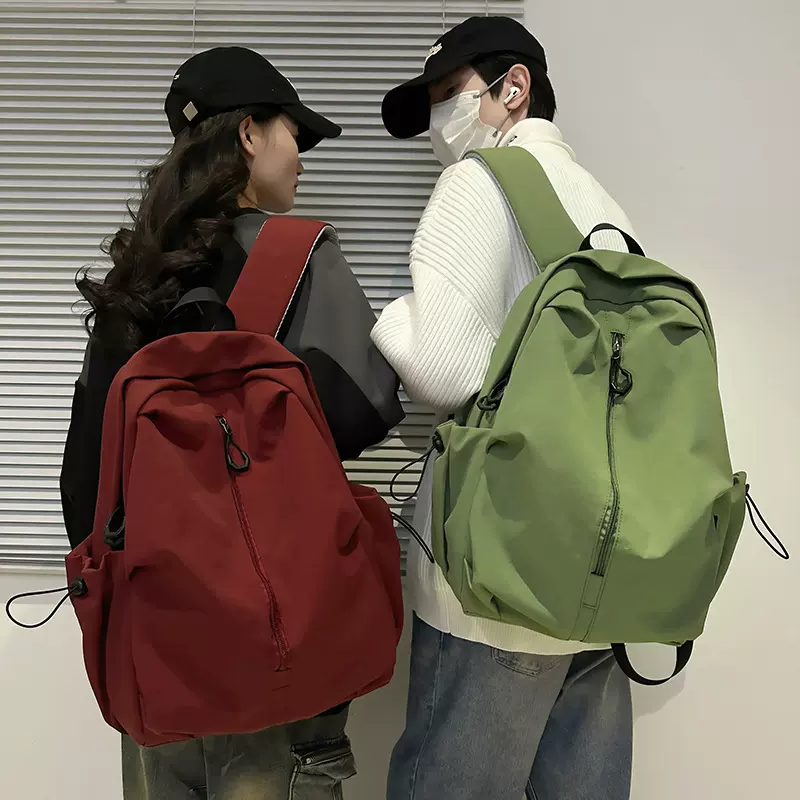 批发复古书包2025新款纯色初高中学生背包大容量防泼休闲双肩包