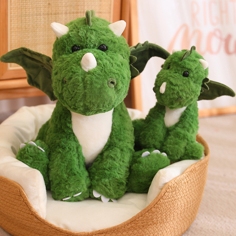 Muñeca de juguete de peluche de huevo de dinosaurio creativo transfronterizo con alas Linda muñeca de dinosaurio de dibujos animados para niños muñeca calmante