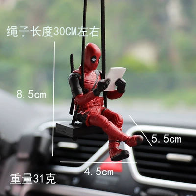 Car hanging Car Pendant Reading Book Little - sitting-on-black-wood-chips-and-reading-a-book