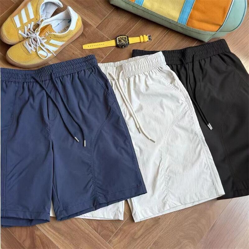 American-style sports quick-dry shorts for men, summer fitness running ice silk pants, outdoor diagonal cut cycling beach quarter-length shorts