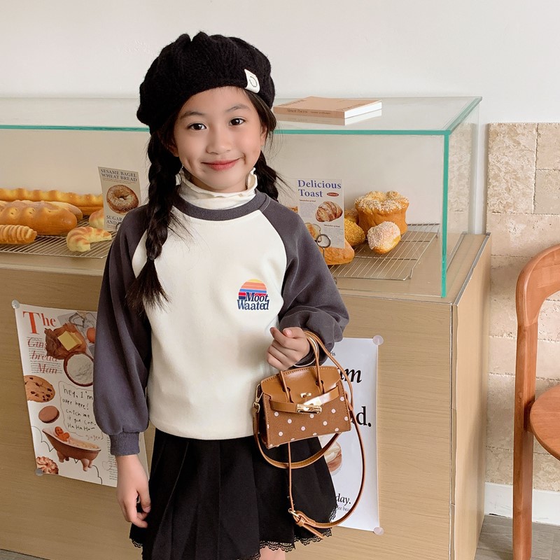 2025 nuevo paquete japonés y coreano de ondas para niños, mini bolso para bebés de alto valor, bolso de moda para padres e hijos