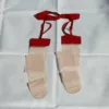 Телесный с красной окантовкой