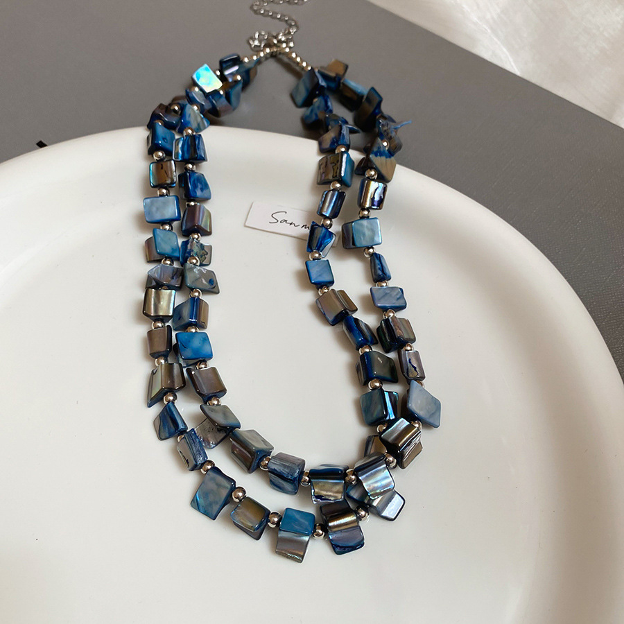 Collar con cuentas de concha de color irregular de verano Cadena de clavícula salvaje retro europea y americana