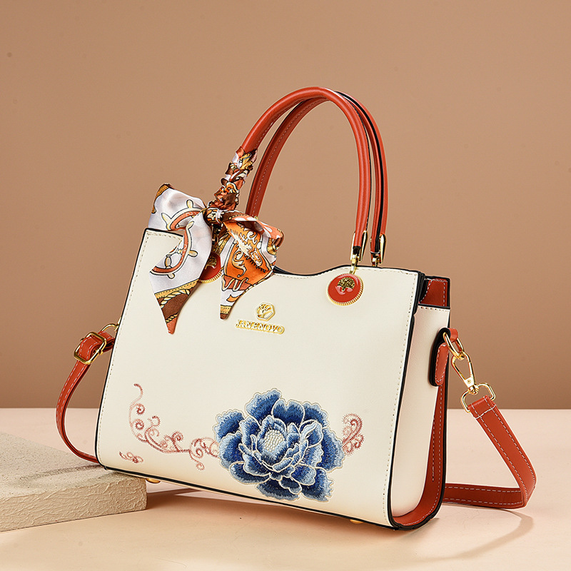 Bolsa de mano de mujer elegante regalo 2025 nuevo estilo para la suegra flores bordadas de moda bolso de hombro