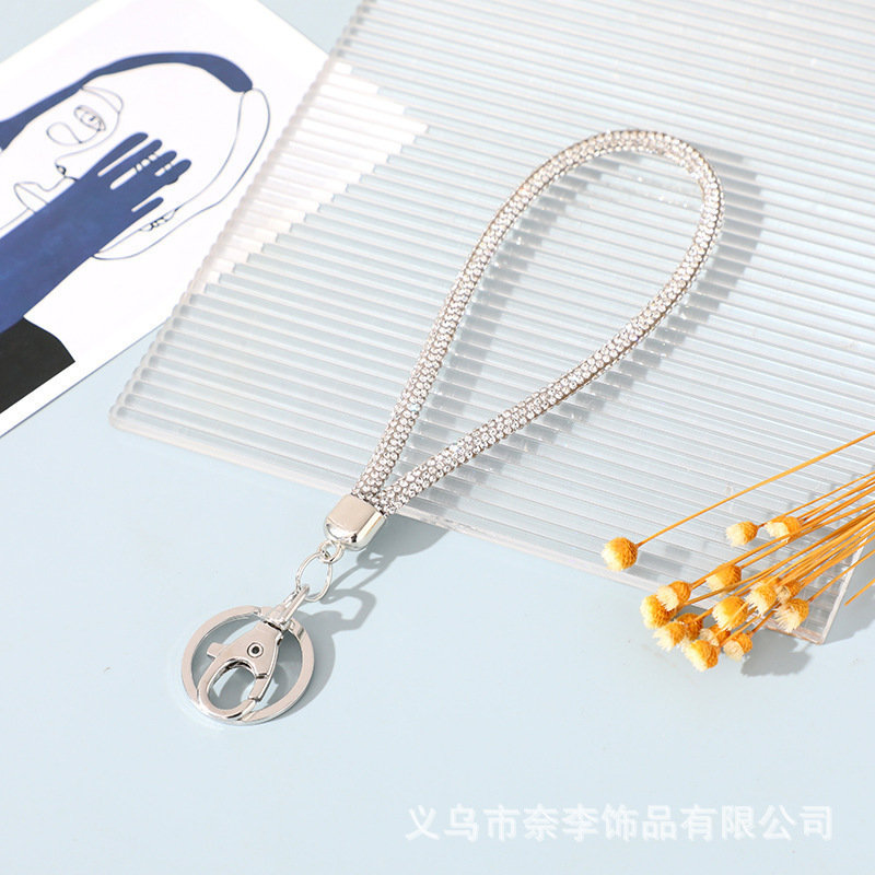 ファッションのアイデアのドリルロープのキーはひもの円管のゴム管のドリルの装飾の自動車のキーロープの部品を掛けて卸売りします。|undefined