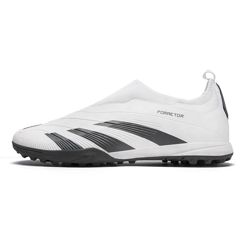 Spot cross-border Putian sin costuras zapatos de fútbol Messi zapatos deportivos de entrenamiento de uñas largas para jóvenes de corte bajo para hombres