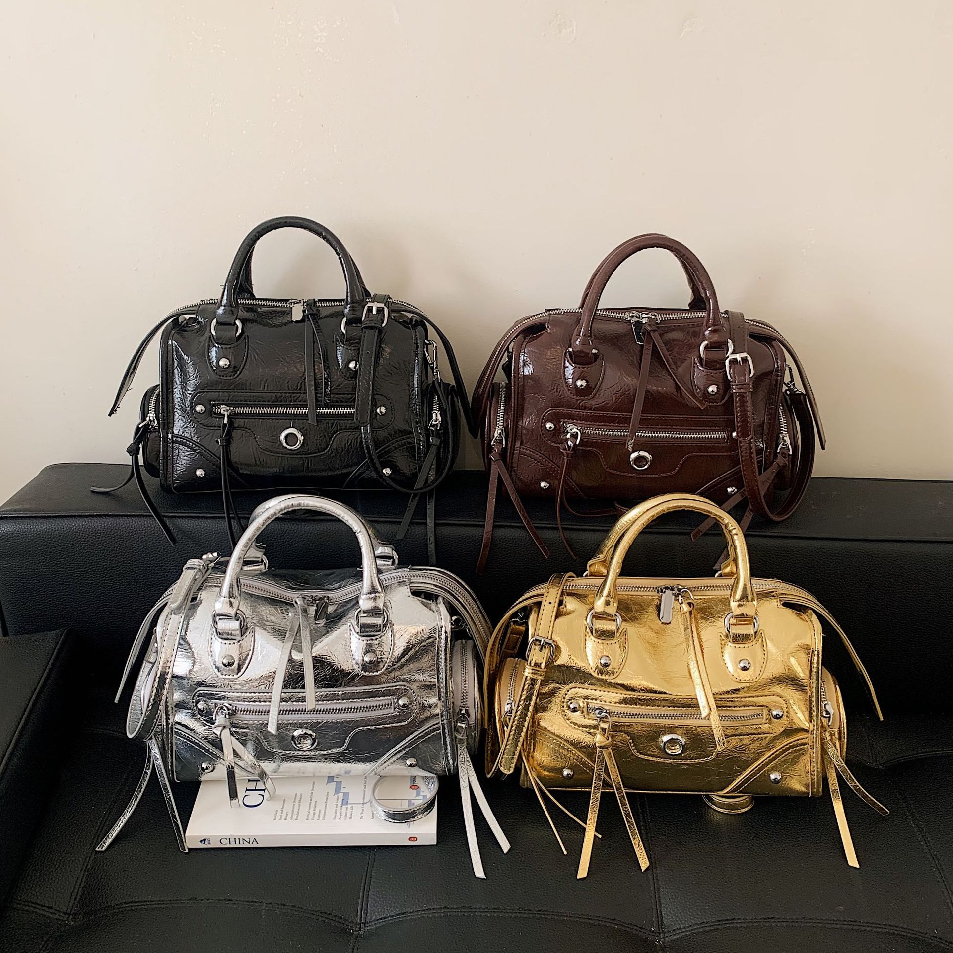 Bolsas de motocicleta retro transfronterizas de moda extranjera bolsas de remaches diarias Europa y América bolsas de hombro de Boston