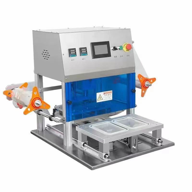 上海厂家热手动销糖罐、铁盒封口机、盖膜机