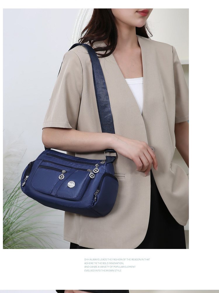 A new popular women's crossbody bag with multiple layers made of Oxford fabric, fashionable, casual and trendy. It's a single-shoulder bag for middle-aged and elderly mothers undefined