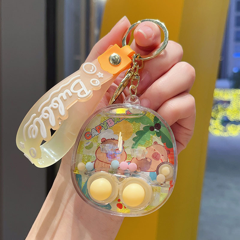 カピ水中シューティングゲーム機キーホルダークレヨンしんちゃんかわいい液体携帯ゲーム機ギフトペンダント|undefined