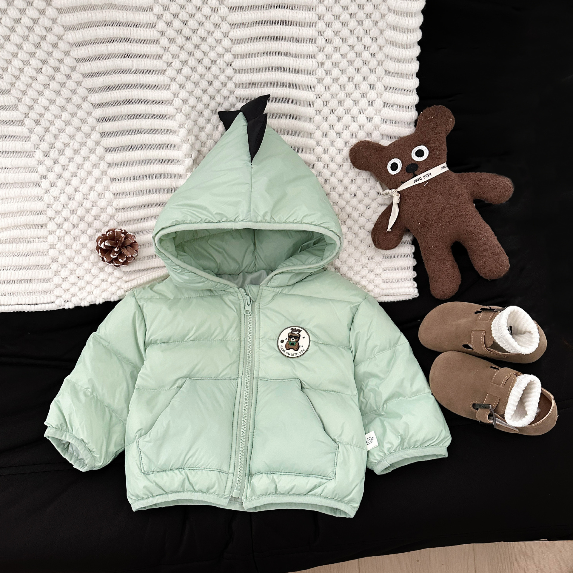 Ropa infantil coreana chaqueta de plumón para niños invierno de aire extranjero chaqueta con capuchón para bebés y bebés con capuchón blanco para calentar aire extranjero