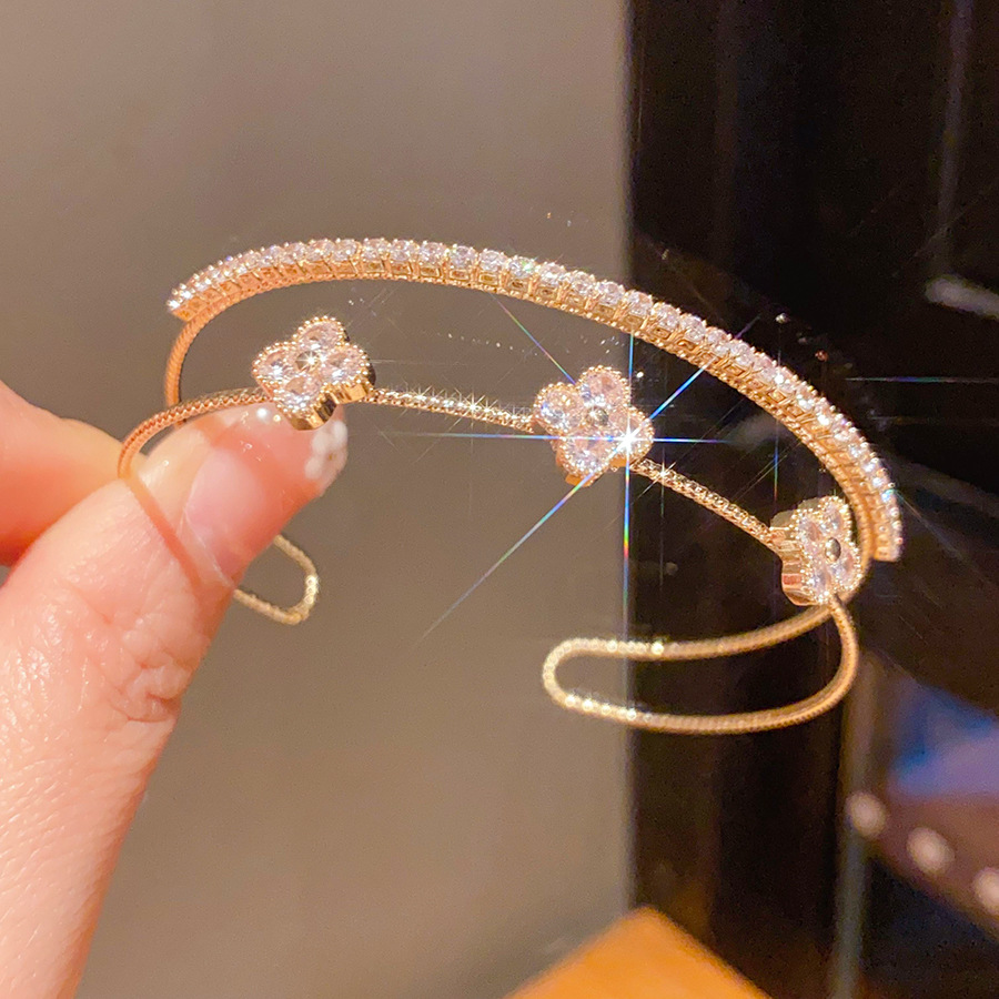 ジルコンの花の十字の二重の開口の腕輪の軽くて豪華な高級感の手環のファッションのinsの百合の手飾りの卸売り