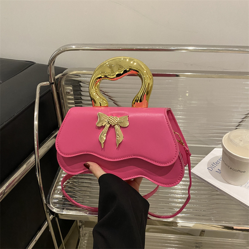 Bolso de arco ondulado damas 2024 nuevo otoño invierno bolso de hombro color caramelo estilo extranjero bolso de mochila elegante
