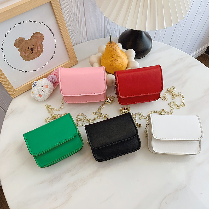 Coreano simple color sólido bolso pequeño para niños y niñas mini lindo bebé mochila 2025 nueva cadena bolso para niños