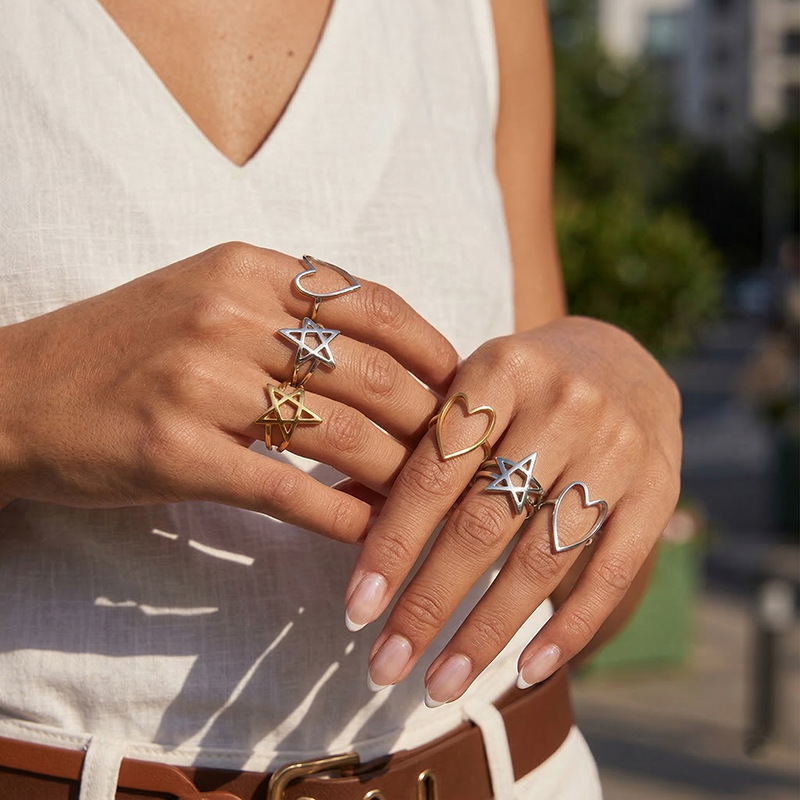 Tiana Europa y América transfronterizos ins aire frío acero inoxidable oro estrellas amor abierto anillo nicho de alta calidad mujer