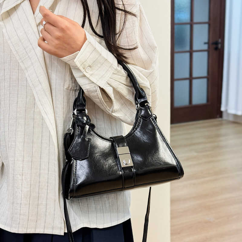 Bolso de moda transfronterizo 2025 primavera nuevo bolso femenino bolso de hombro de textura de alta gama bolso de mensajero retro Maillard