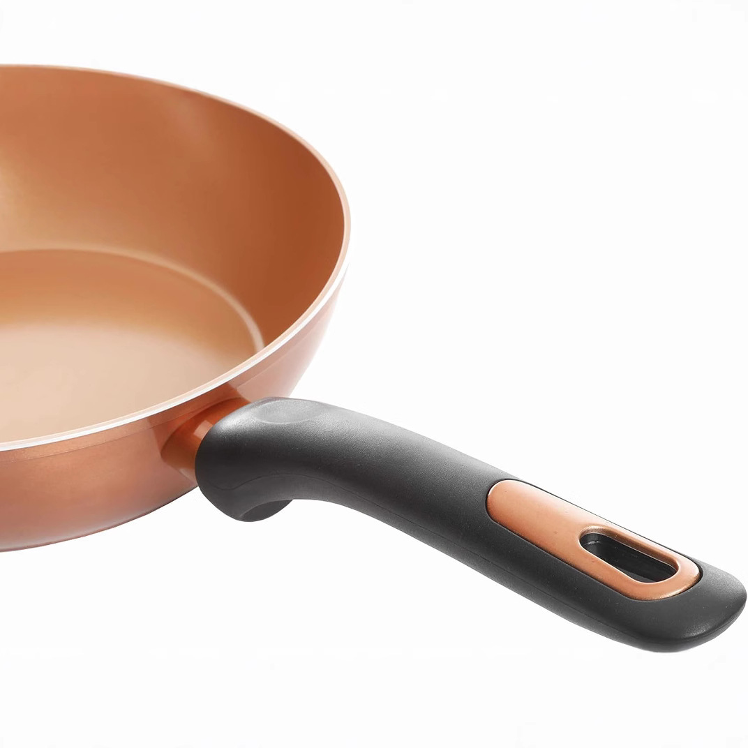 Comercio exterior transfronterizo cerámica antiadherente conjunto de cocina doméstica cocina electromagnética cocina de gas general mayorista