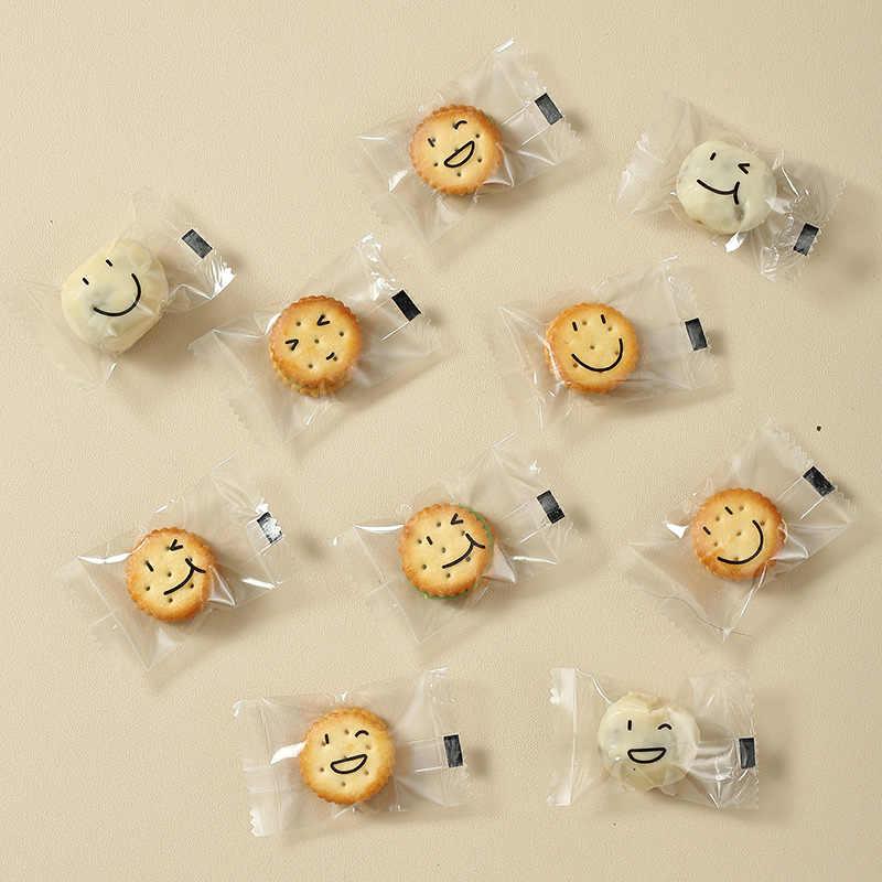 Botón de dibujos animados grueso galletas bolsas transparentes tortilla de nieve nougat horneado galletas de leche datilla sellado mini embalaje