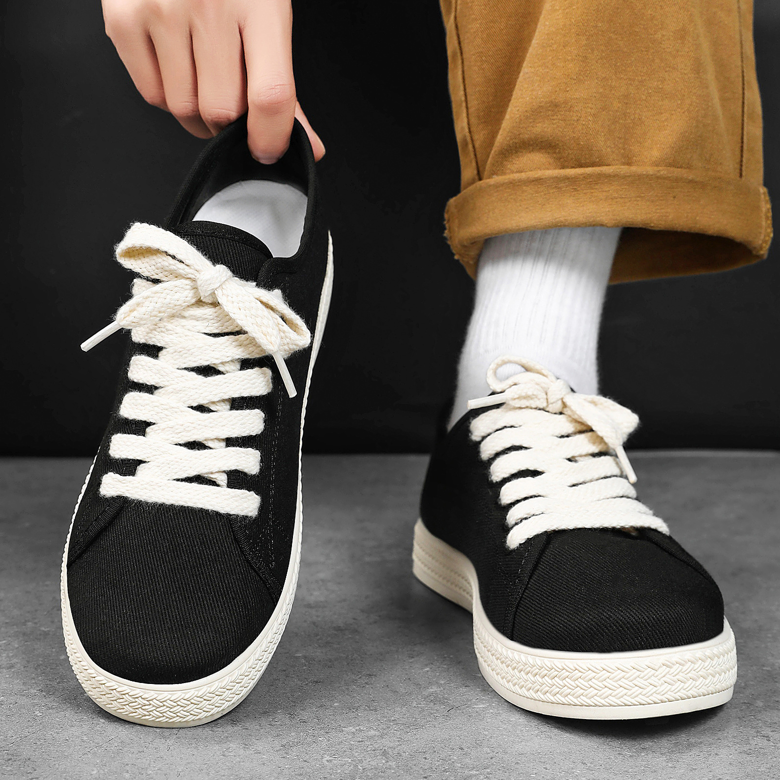 Zapatos de hombre 2026 primavera zapatos casuales respirables zapatos de lona simples delgados versátiles zapatos de moda retrógrados zapatos únicos zapatos de skate ligeros