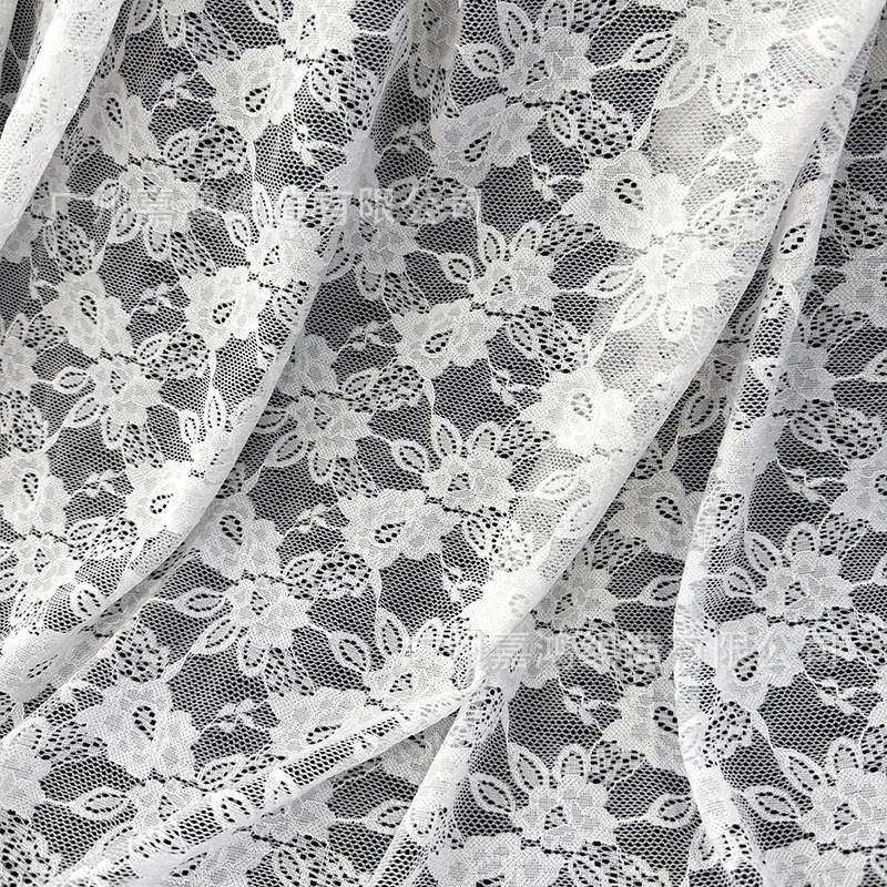 Primavera y verano nueva tela de encaje brocado amoniaco flores elásticas encaje hacer camiseta base vestido tela de encaje