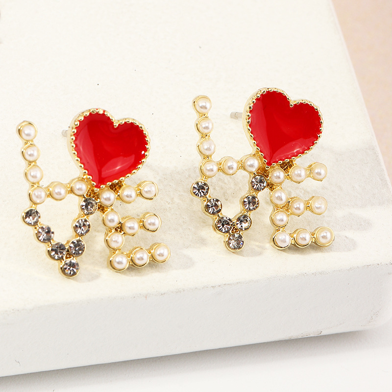 Fashion Heart-shape Pearl Letter Earrings display picture 20