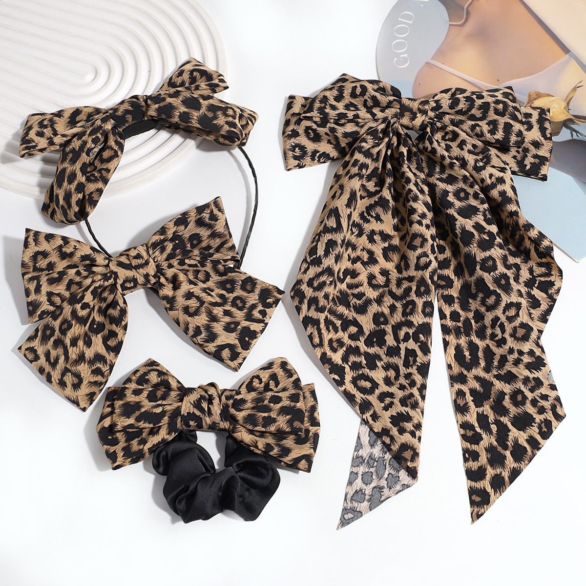 Estilo de moda europeo y americano personalidad nicho de diseño arco leopardo aro de pelo clip de resorte retrógrado anillo para el pelo accesorios para el pelo