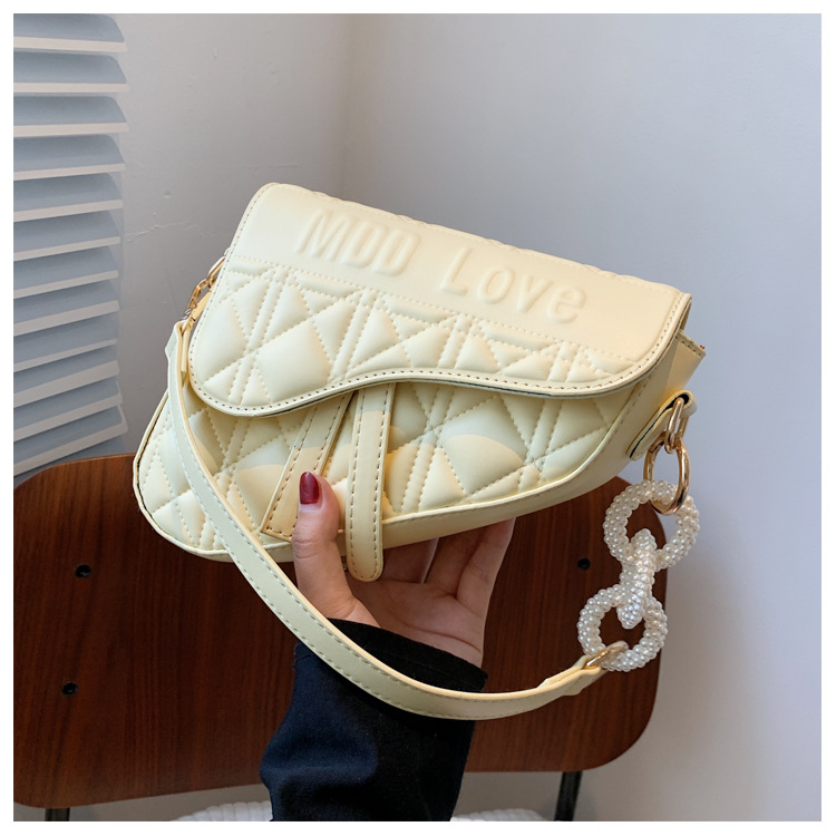 New Solid Color Rhombus Embossed Shoulder Underarm Saddle Bag display picture 4