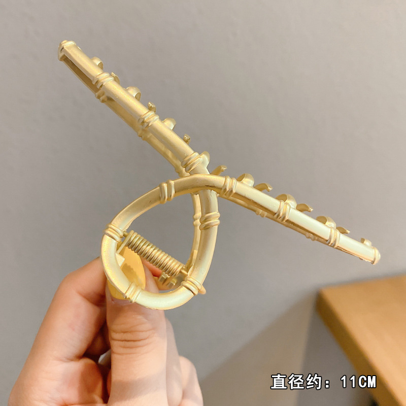 Pinza de cabello metálica coreana de alta sujeción con diseño retro