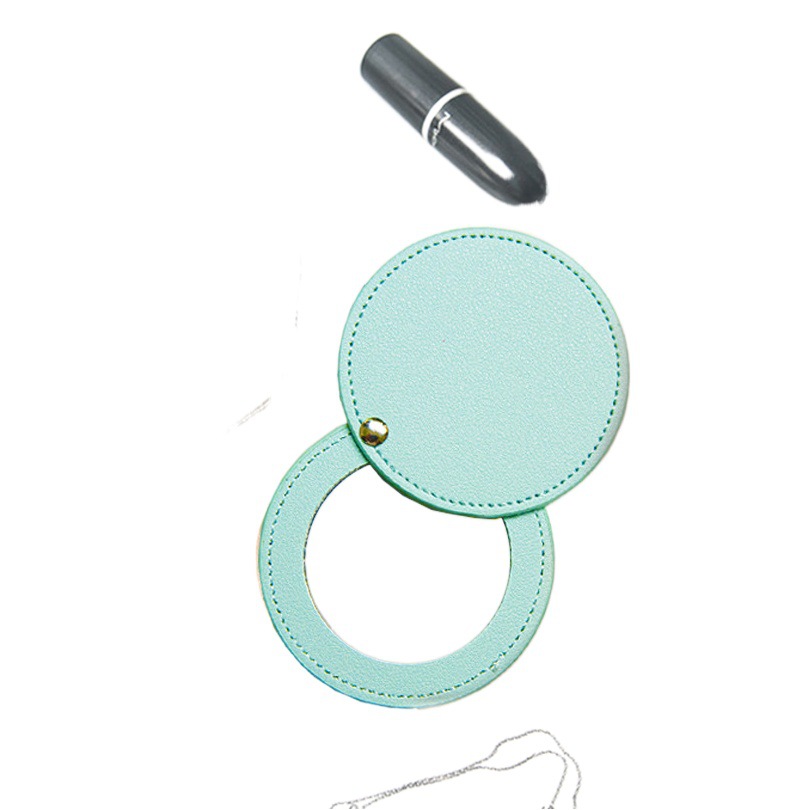 Regalo portátil pu maquillaje espejo moda publicidad regalo belleza espejo fábrica al por mayor giratoria cuero maquillaje espejo