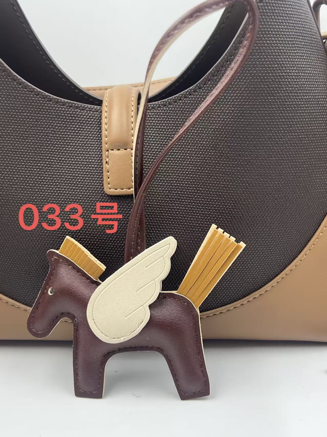 Colgante de bolsos Pegasus Mini Colgante de bolsos de estilo simple llaver de cuero image 37