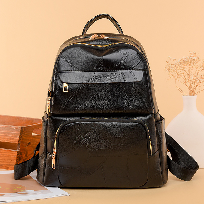 Nueva mochila casual de moda para mujer, mochila de gran capacidad simple de todo fósforo, viajes, viajes, viajes, bolsos de viaje al por mayor