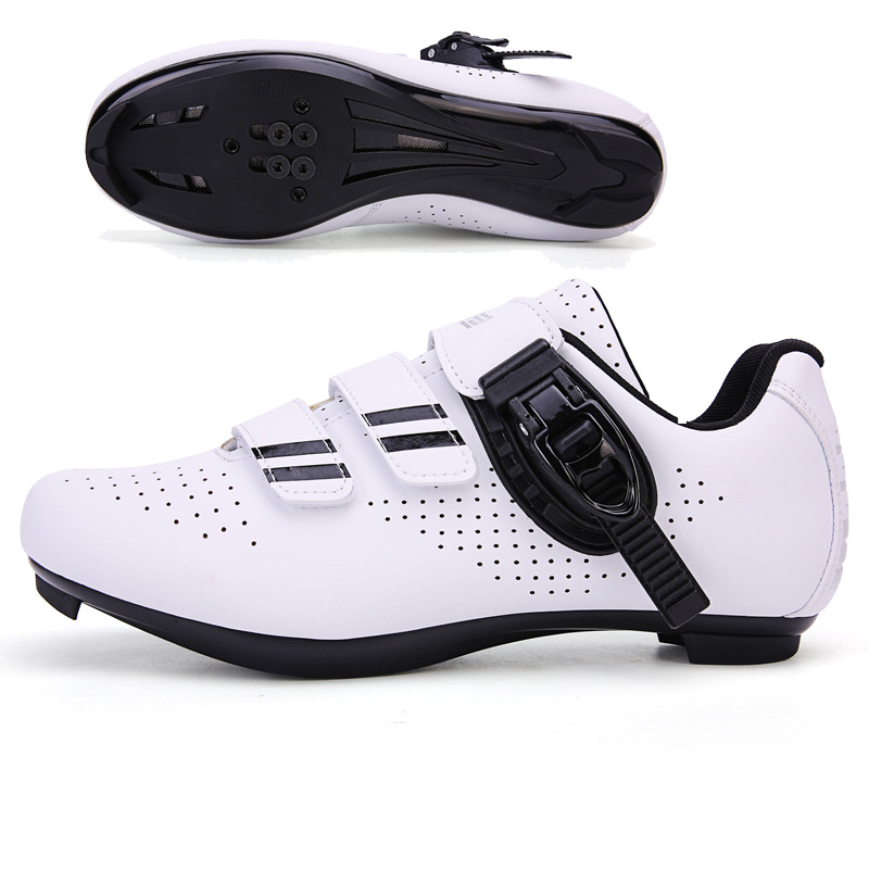 흰색과 검은 색 도로 잠금 신발